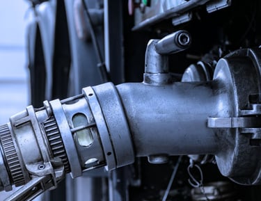 "Industrial hydraulic cylinder machinery with metal fittings and mechanical components"