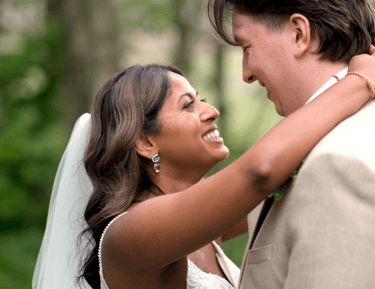 A bride and groom embracing