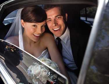 Luxury limousine arriving at upscale Charlotte event venue, providing premium chauffeur service