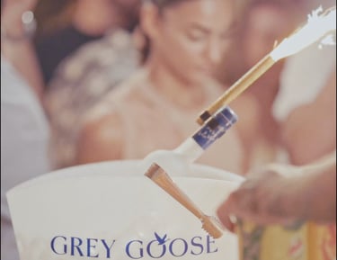 Bottle service at a beach party