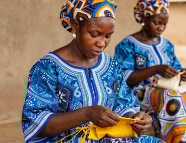 A formal meeting between art fair partners discussing strategic collaborations.