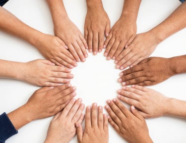 Close-up of colorful paintbrushes and palettes ready for creative use.