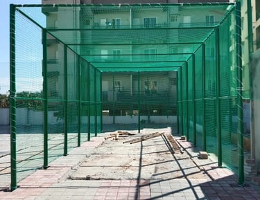 Wide view of a sports net installed on a local playground in Ahmedabad.
