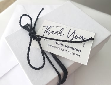 a thank card with a thank card attached to it