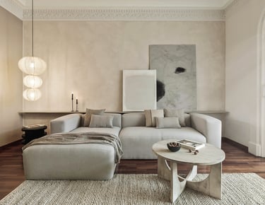 Sophisticated Living room with modern decor, custom lighting, a neutral color palette and art