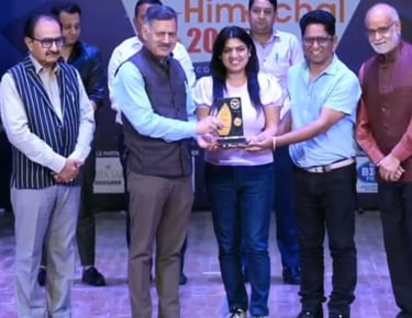 Award by State minister to Dr Neetika and Dr Vikas
