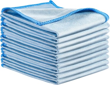 a stack of folded towels with a blue and white towel