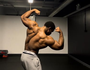 Man flexing back muscels.