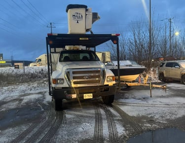 a large white truck parked in snowy northern ontario