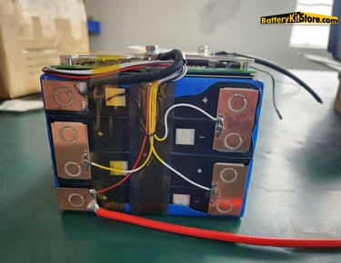 a pack of prismatic LFP battery cells with BMS board