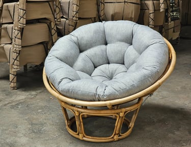 Papasan chair. Great for bulk orders because it's highly stackable, efficient in container.