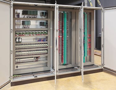 a large electrical cabinet with many wires and wires