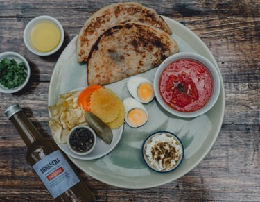 a plate with a variety of food items on it