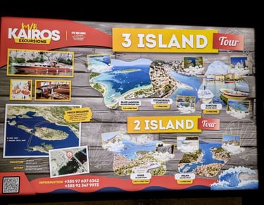 The picture shows a billboard advertising a visit to three islands during a one-day boat trip.