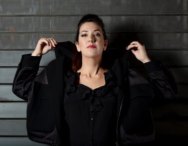 a woman in a black jacket and a black jacket