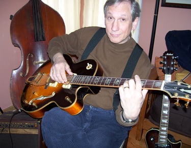 Bob Bushnell with guitar for private guitar lessons in Hopkins, Minnesota