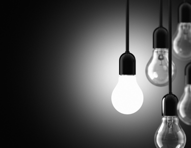 a bunch of light bulbs hanging from a ceiling, contento consulting, creazione concetti