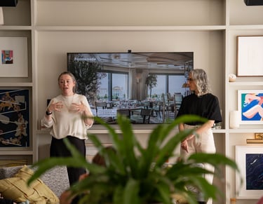 Two women explain about product to the audience