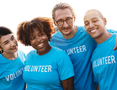 A group of volunteers in smiling face
