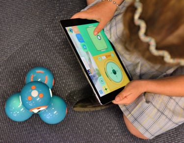 a child playing with a phone phone