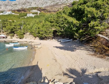 The photo shows Rape's western end, the best beach for families with children.