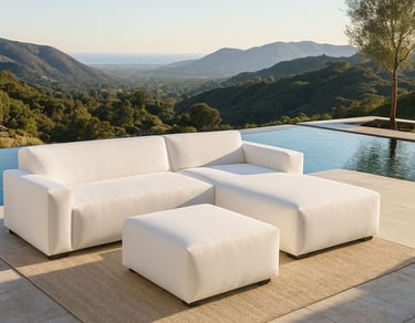 Modern white sectional sofa by Solo Home Decor in a luxurious mountain backyard with an infinity pool and ocean view.