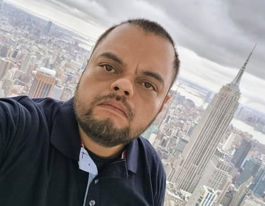 a man with a beard and a beard in a black shirt