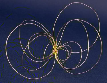 Mabstract etal wire sculpture representing wings