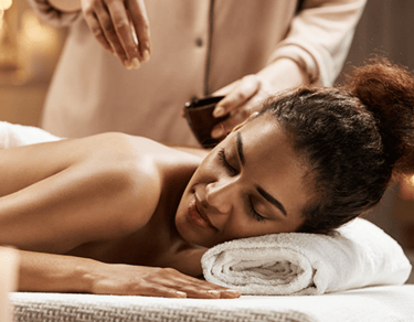 Hot stone body treatment