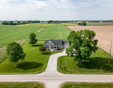 country home surrounded by farm land