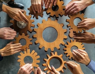 Roues crantées représentant la structuration durable des actions en santé mentale en entreprise