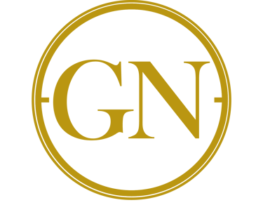 a golden circle with the letter gn in the middle