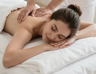 Massage is being administered to a person's back.