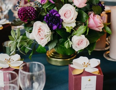 Luxury editorial wedding table detail with floral centerpiece in Provence