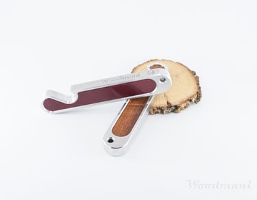 aluminium bottle opener with inserts made from purple heart and mahogany wood