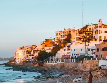 a beach with a boat in the water