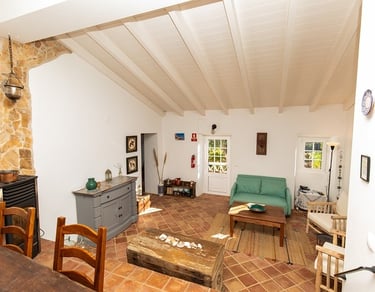 a living room with a couch and a table