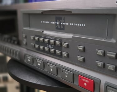 A photo of an 8 track ADAT tape transferring machine.