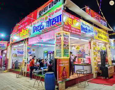 Stalls serving diverse culinary delights from different Indian states at Kota Dussehra Mela.