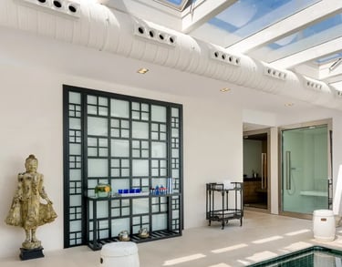 Indoor spa with heated pool, sauna, and relaxation area at Villa El Olivo, Marbella