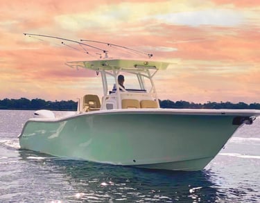 a man fishing on a boat in the water