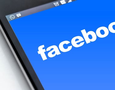 Facebook logo on phone