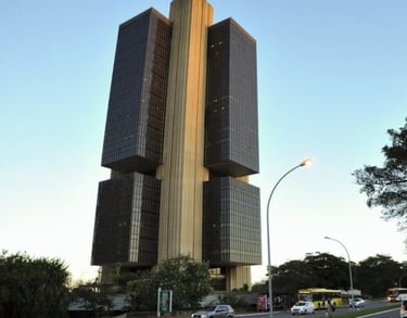 a large building with a tall tower in the middle of it