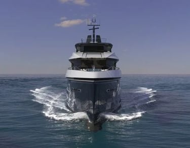 a boat in the water with a large boat in the background