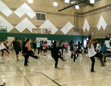 Enhancing Forward Action Inc. image of a group yoga
