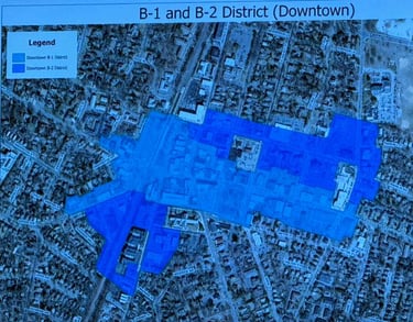 Satellite map of downtown Ridgewood. A blue B1 and B2 overlay sits above.