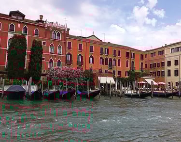 a group of boats on a Canale Grande  in Venice