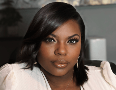 a black woman in a white shirt