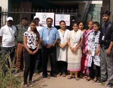 a group of people standing in front of a building