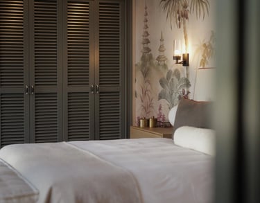 Bedroom at Villa La Gratitud with natural textures and warm lighting
